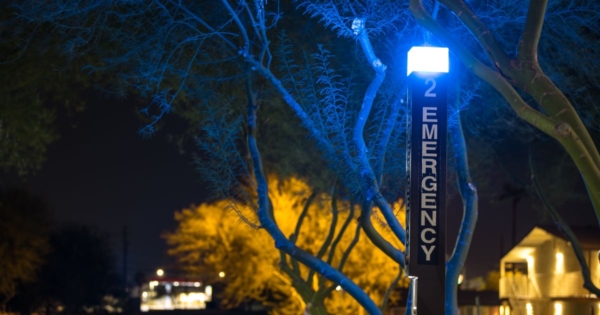 emergency campus safety light lit up at night
