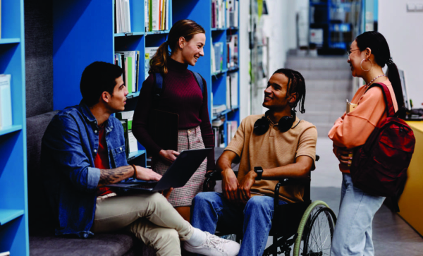 Diverse group of college students in a ilbrary